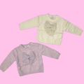 Maglione neonata con applicazione fiocco - 12/36 mesi