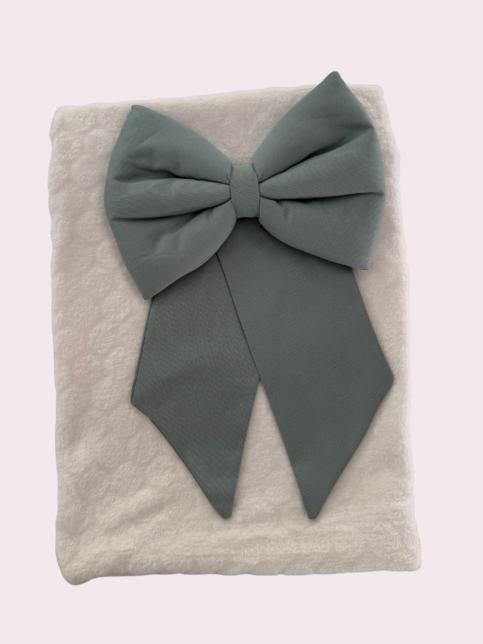 Coperta in ciniglia con fiocco per carrozzina